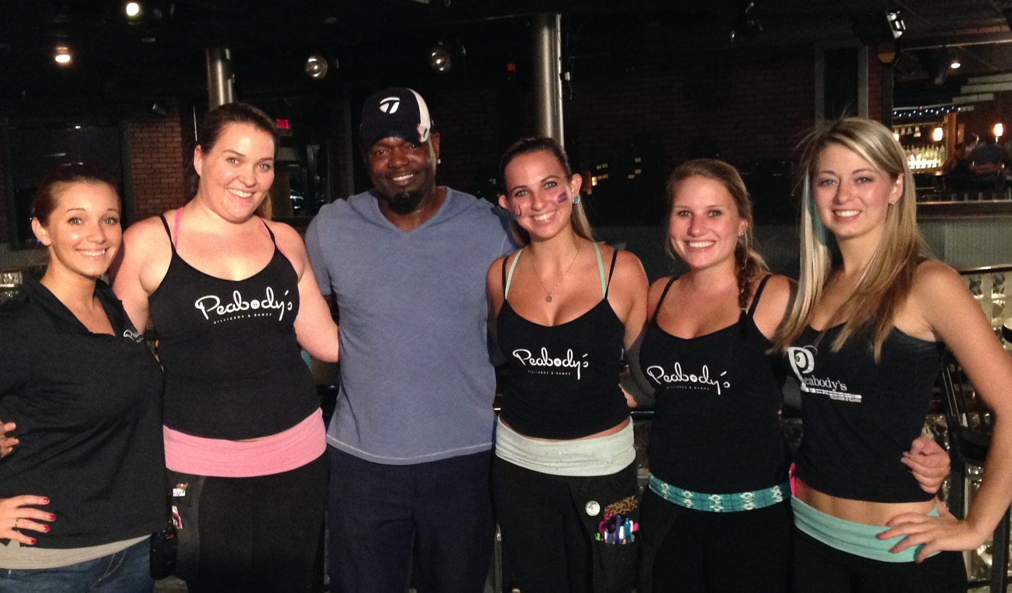 Emmitt Smith with the Peabody’s staff.